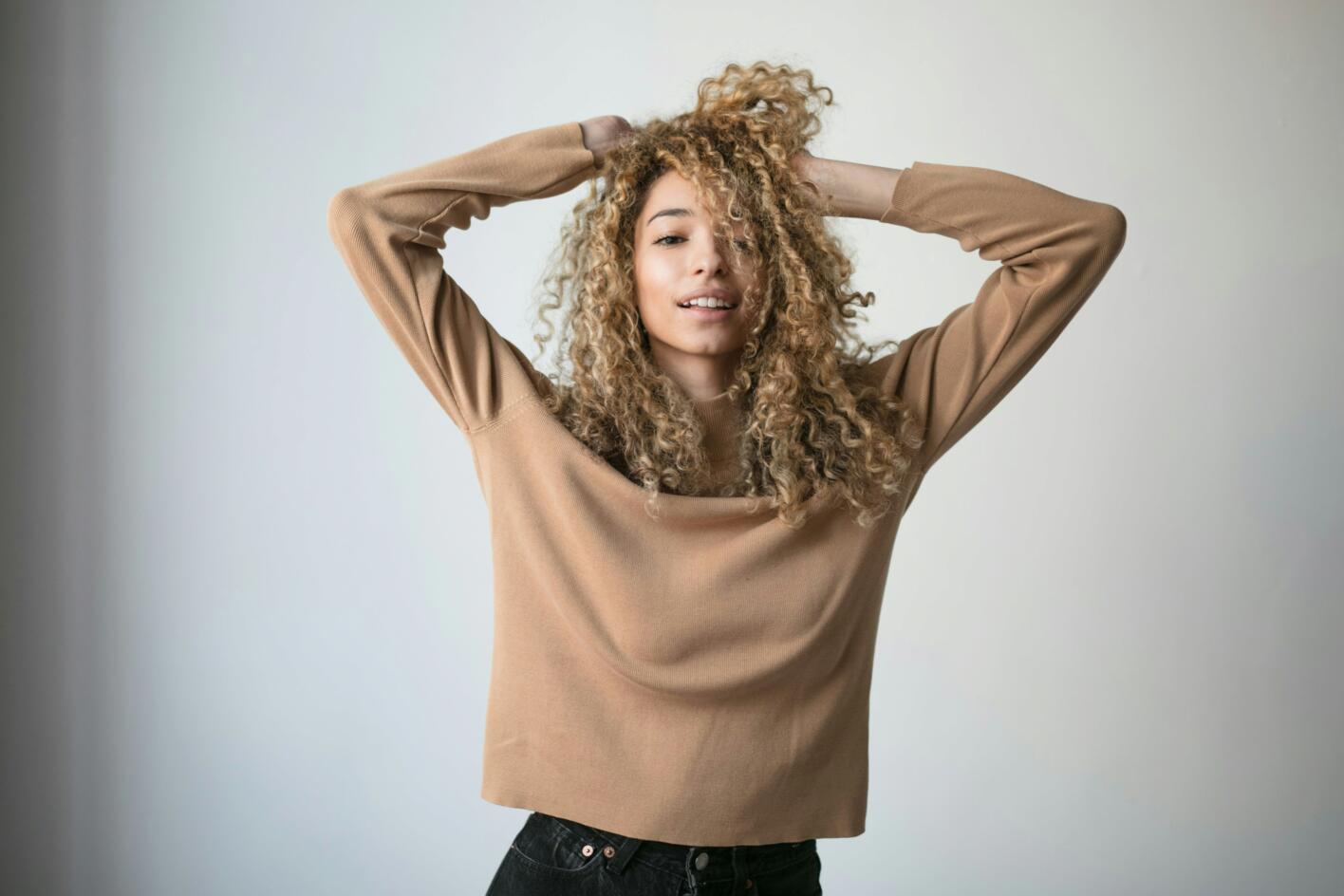 Young woman with very curly hair