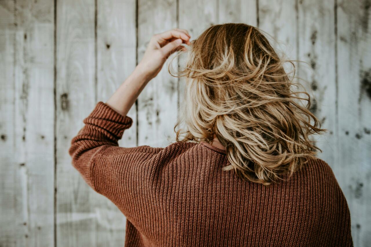 Woman with short blonde hair