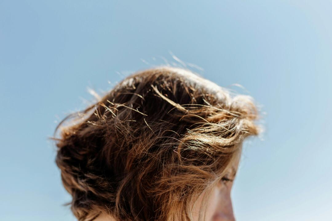 Woman with short sun-damaged hair